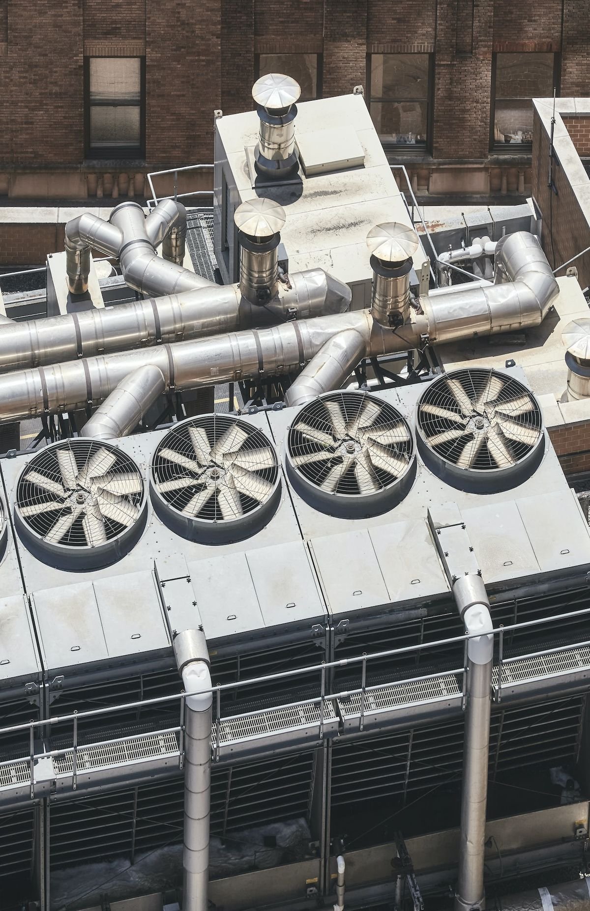 Air conditioning condenser unit outside a home